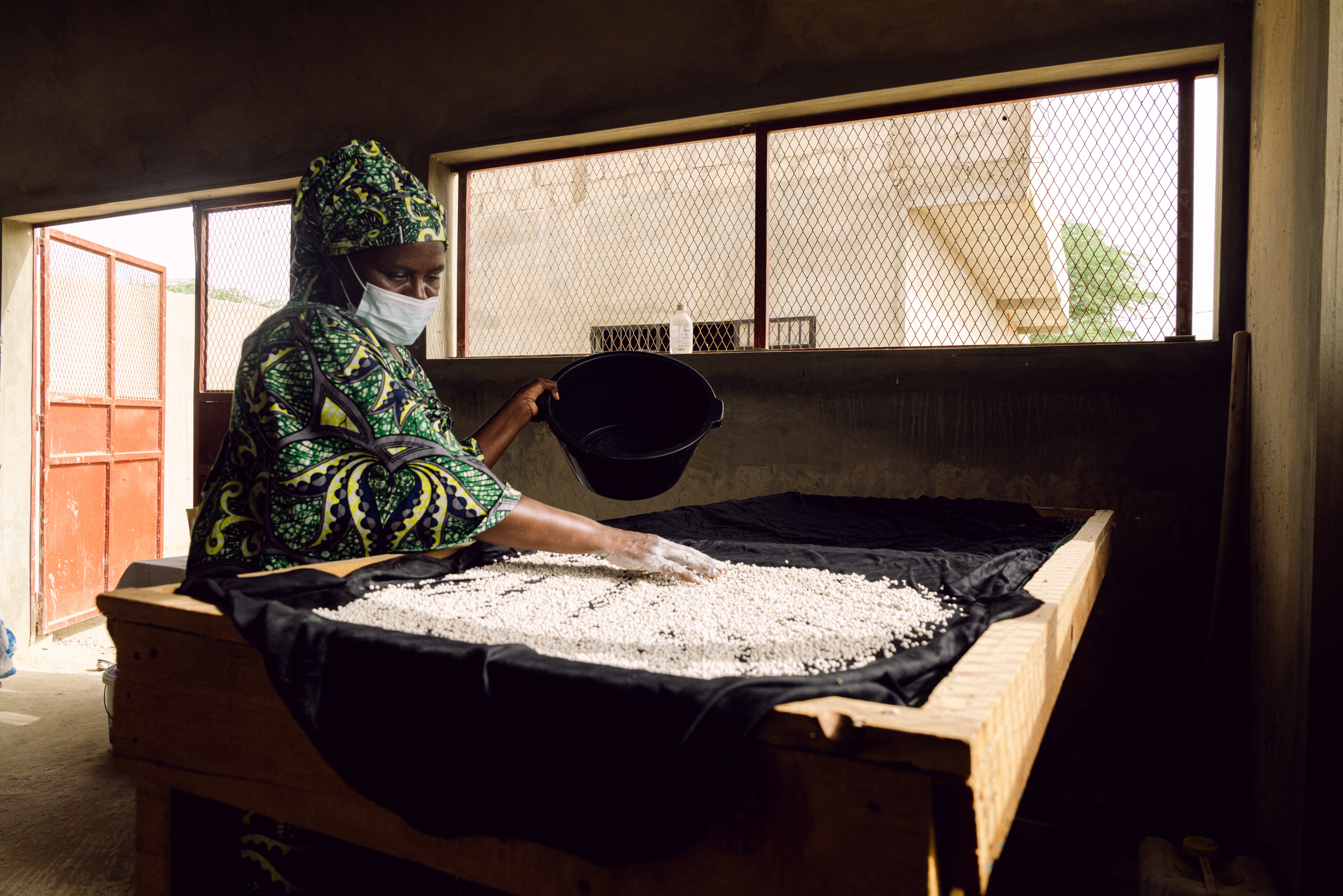 A member of the women’s cereal processing and production group in Sanar Walof village near Saint-Louis, Senegal. Photo Credit: Ollivier Girard/ICARDA