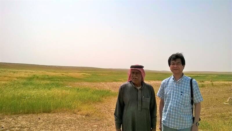 Jordanian rangeland farmer Mr. Ali Askar from Al Majeddyeh village with Prof. Tsunekawa of Tottori University (Japan) inspect a rainwater harvesting research site.