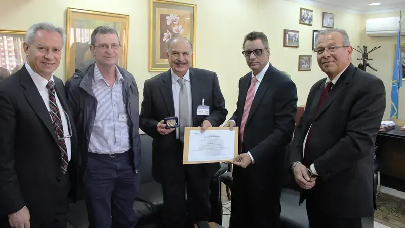 ICARDA’s Director General, Dr. Mahmoud Solh, receiving the FAO 70th Anniversary Commemorative Medal