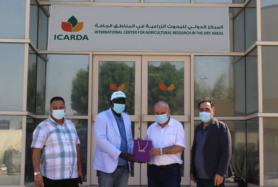 Dr. Abdoul Aziz Niane (center left), Dr. Azaiez Ouled Belgacem (center right)