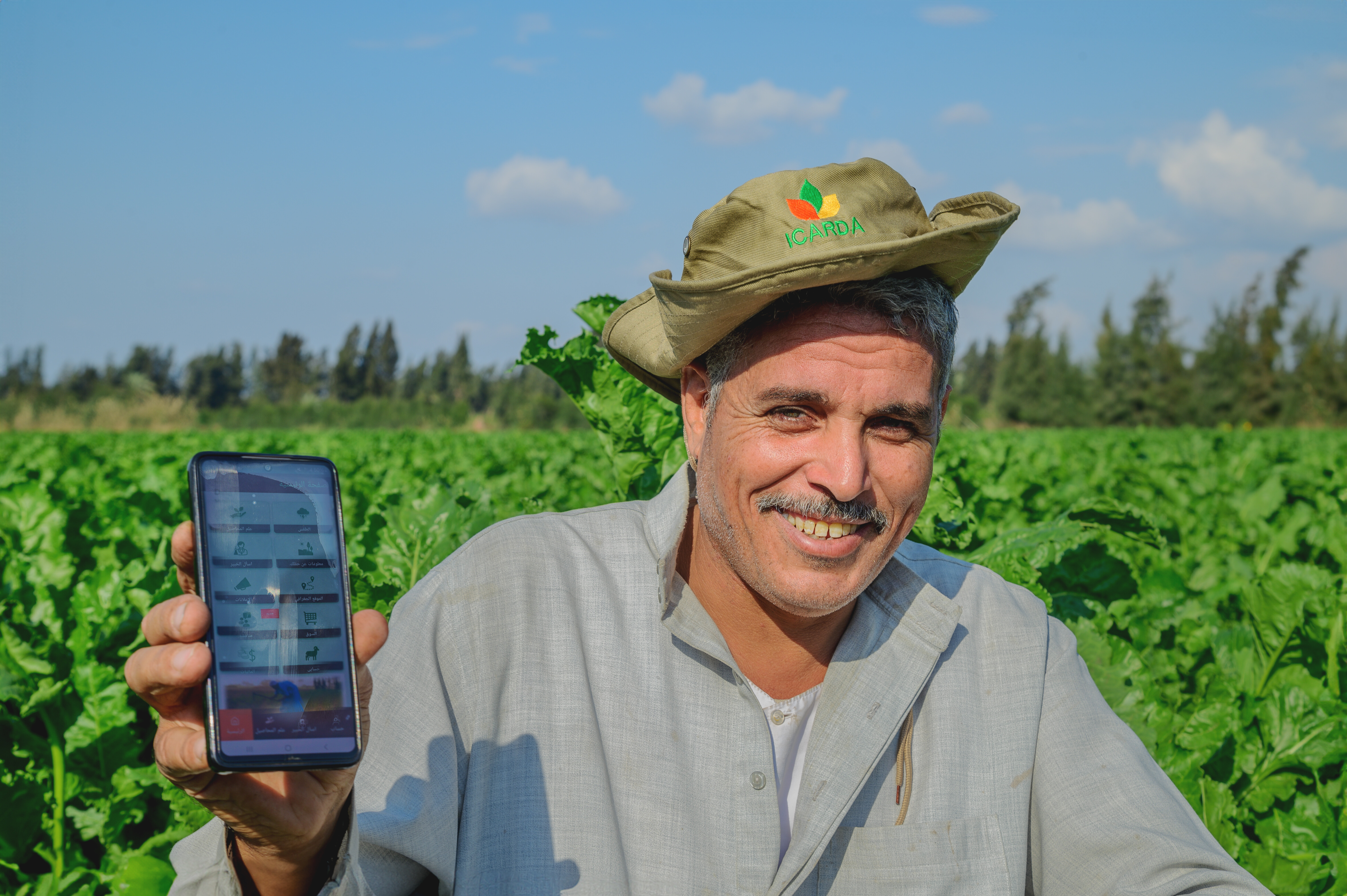 Farmer using GeoAgro-Misr App, Kafr ElSheikh, Egypt. Photo: Ahmed El Sheemy/ICARDA 