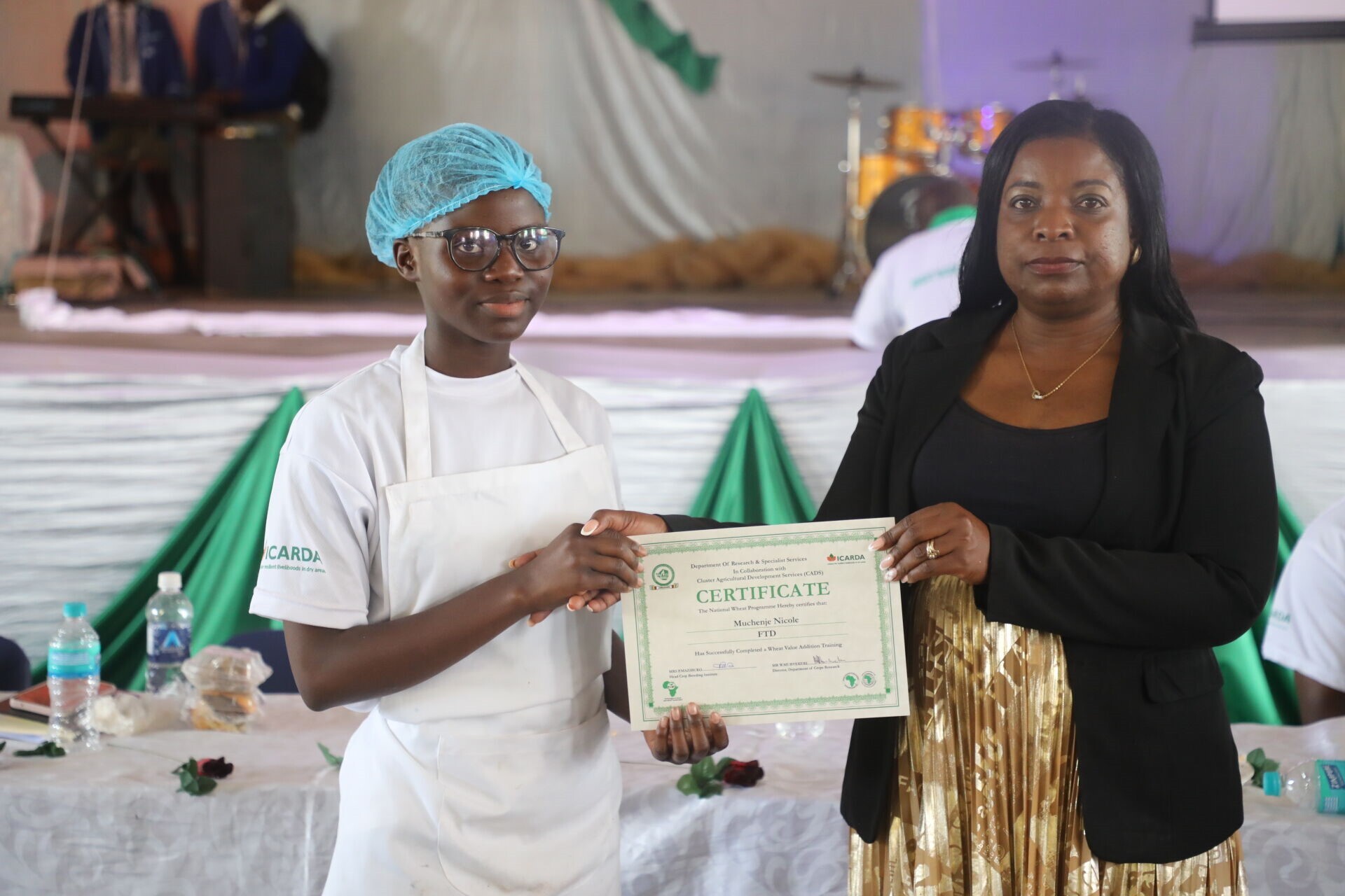 Participant, Nicole Muchenje, receiving her certificate - Photo: Jacqueline Tanhara/MLAFWRD