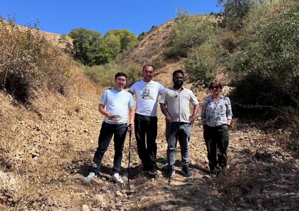 From left to right: Nuriddin Samatov; Jurabek Tulayev;  Abeyou Worqlul; Mira Haddad. Project team during validation visit to the Tashkent region on September 18, 2025.